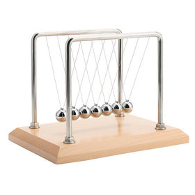 CERROPI Newtons Cradle seven balls demonstrating precise alignment for smooth motion.