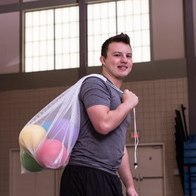 Heavy-duty mesh storage bag keeps balls organized and portable.