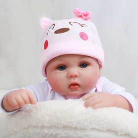Lucy doll with soft cloth body offering gentle, cuddly feel