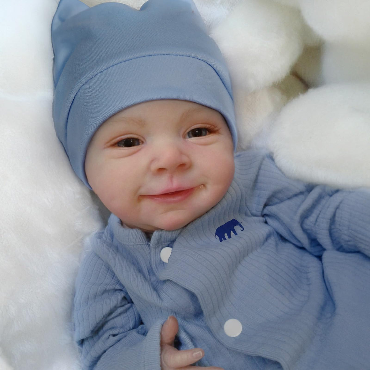 CHAREX baby boy in blue onesie and hat for dress-up play