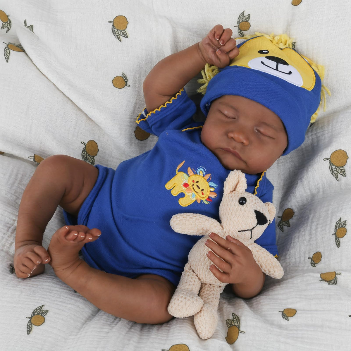 CHAREX Realistic Reborn Doll wearing blue onesie ready for cuddles and display