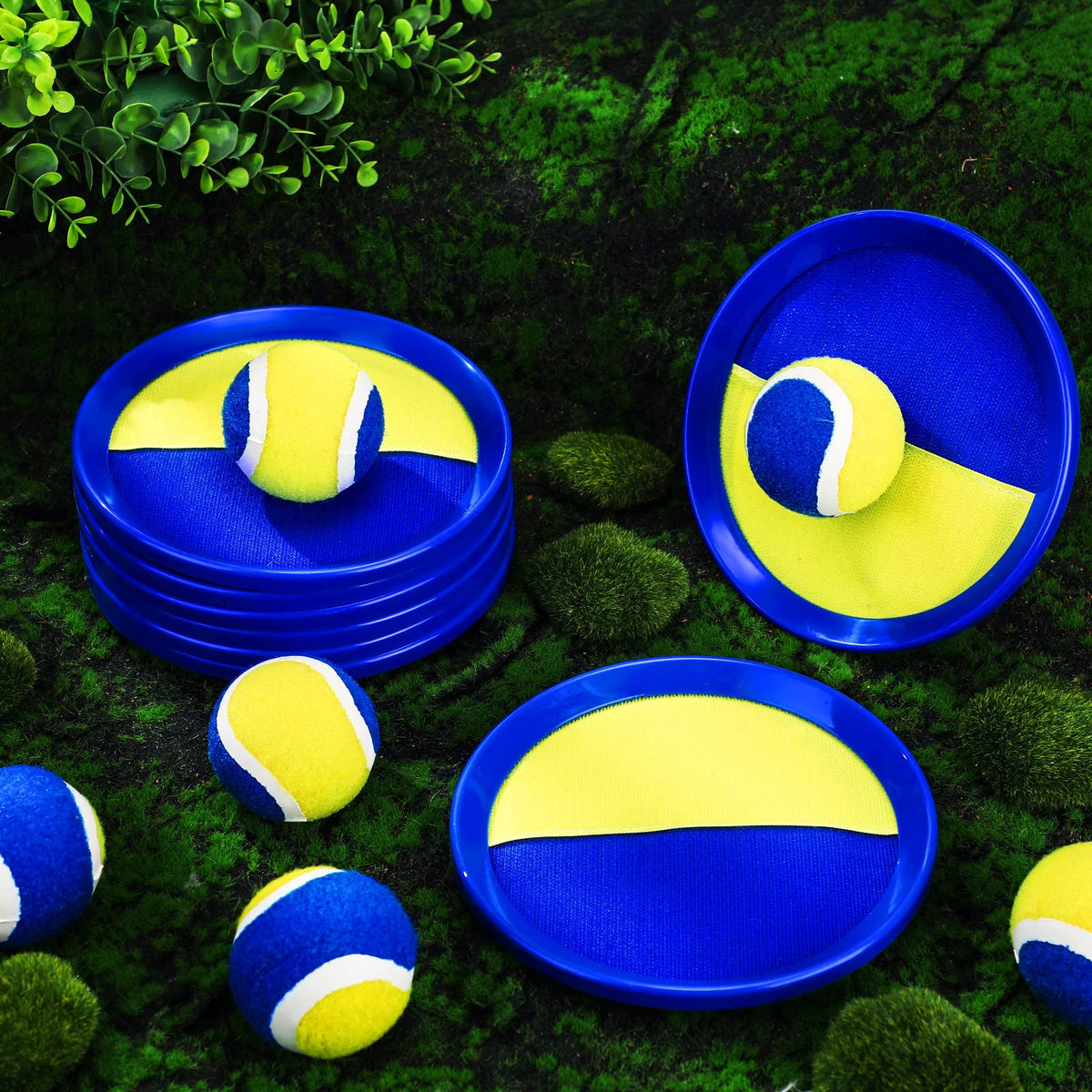 Charniol family plays outdoors at the park using the toss set.