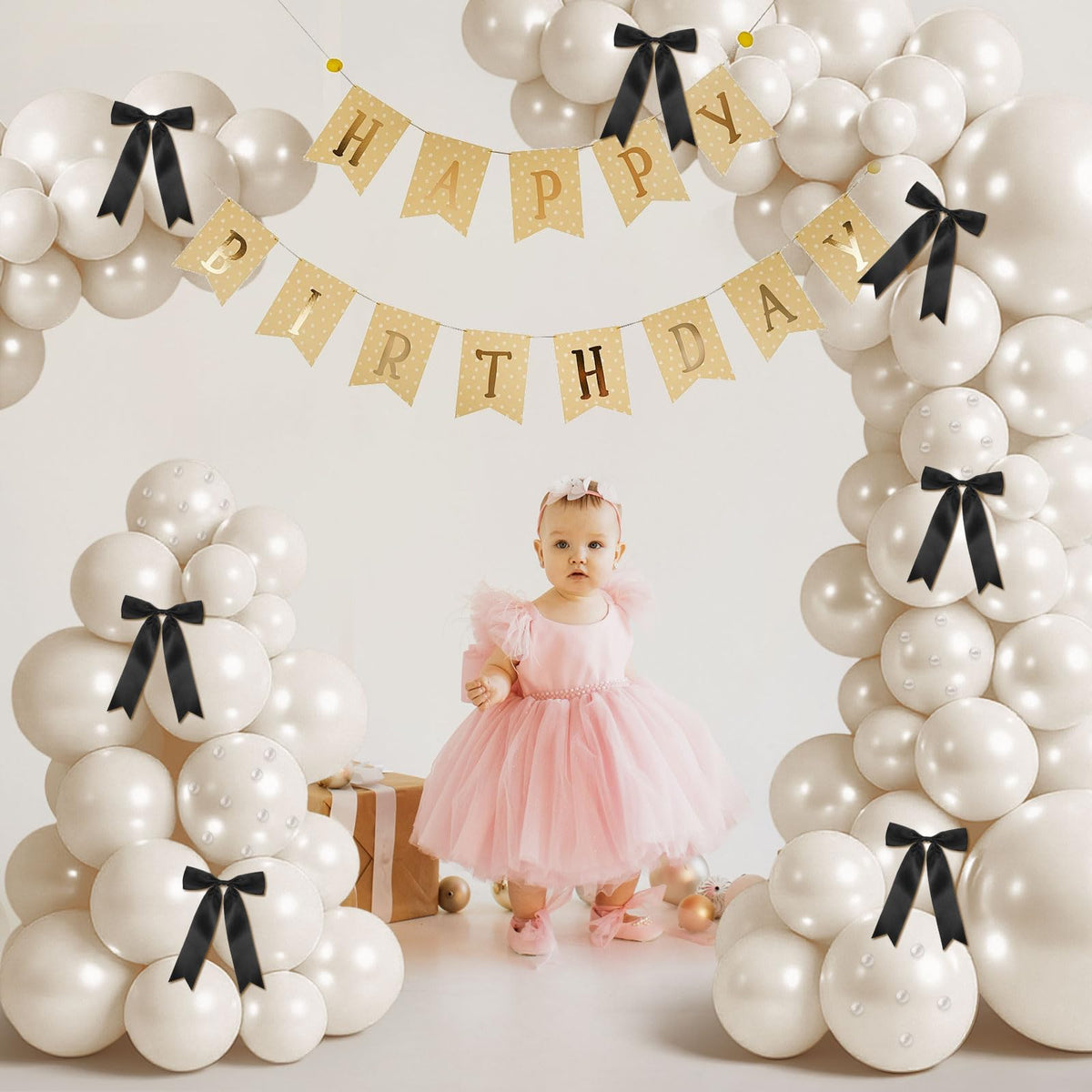 Charnoel black bow for balloon arch adds retro touch