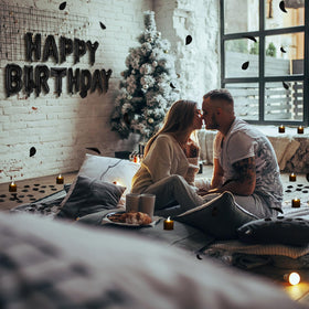 Charnoel party decor ideas featuring banner petals and lights
