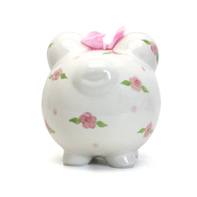 Closeup of hand-painted colors on Child to Cherish piggy bank for imaginative play