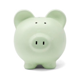Child to Cherish green piggy bank side view highlights durable ceramic design.