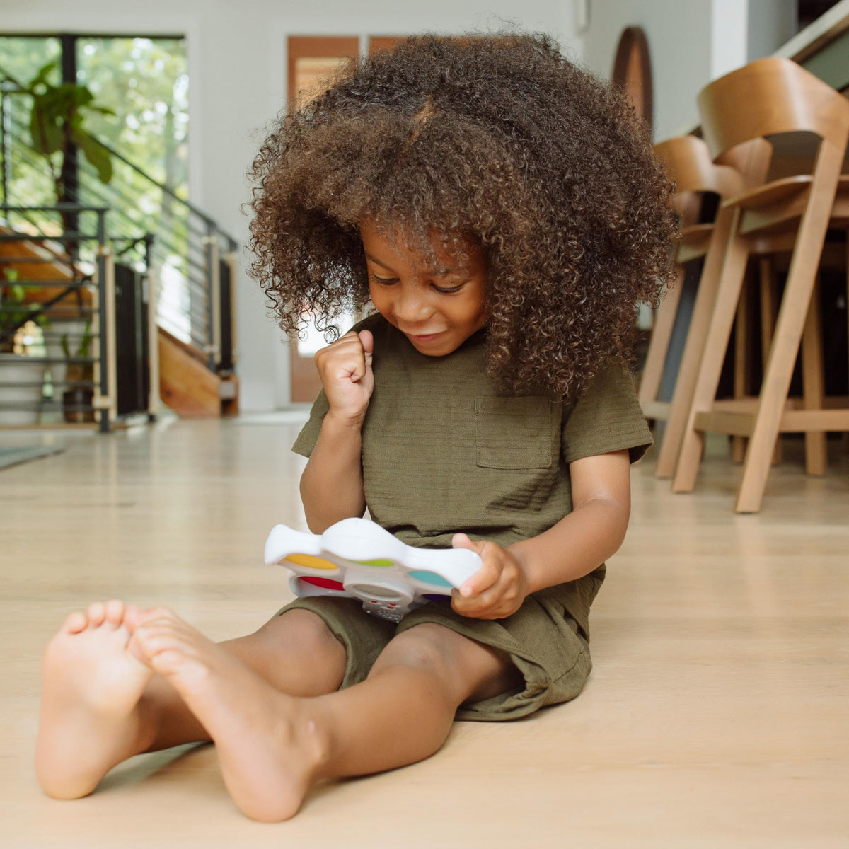 Chuckle & Roar Pop It! and Learn — Quiet mode offers calming light shows for focused play.