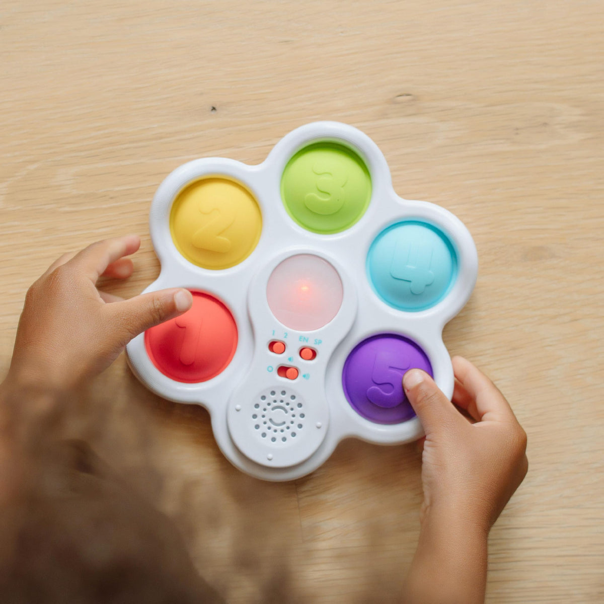 Chuckle & Roar Pop It! and Learn — Fine motor skills supported by hands-on popping play.