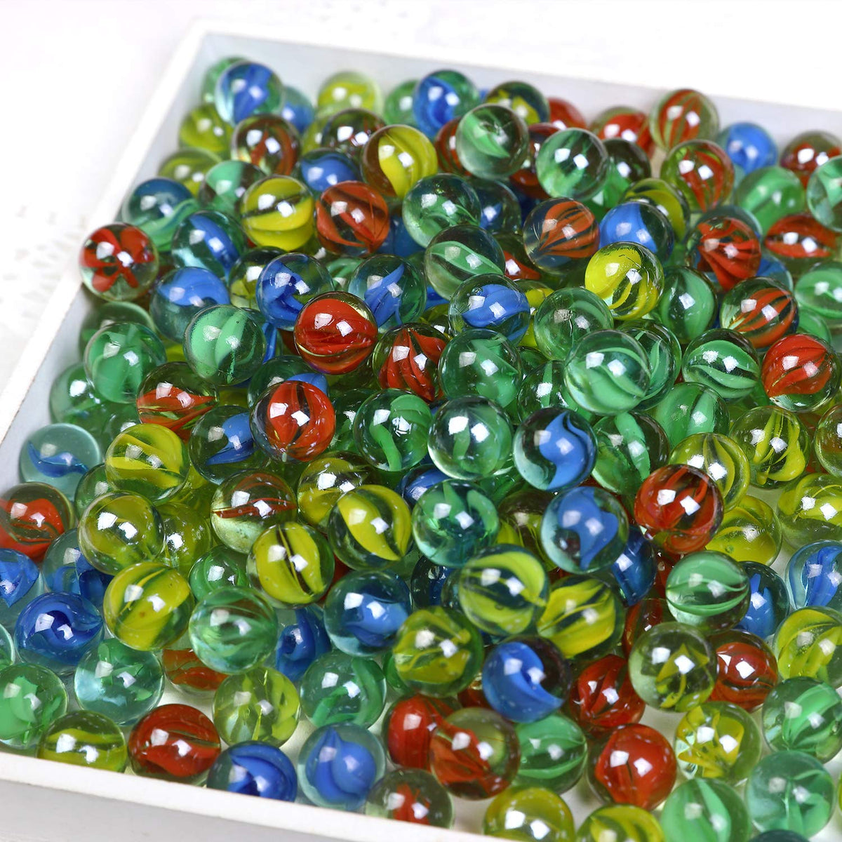 CHUKEMAOYI cat-eye glass marbles in green shooter set, ideal for skill games.