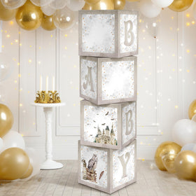 Chunful magical wizard baby boxes with castle-owl design create a whimsical party backdrop.