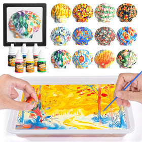 Ci Vetch water marbling kit setup showing desk layout for kids' art time and classroom projects