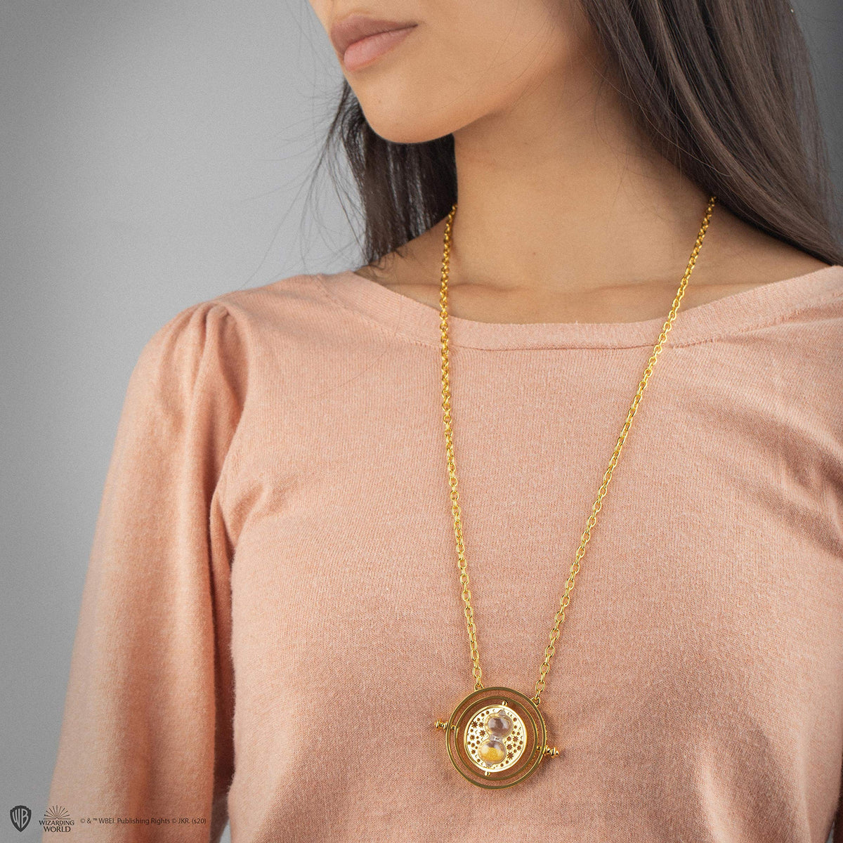 Cinereplicas Time Turner with official license seal visible.