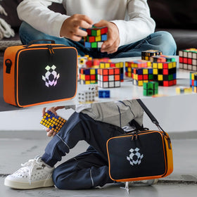 Compact one-shoulder carrying bag keeps cubes organized on the go