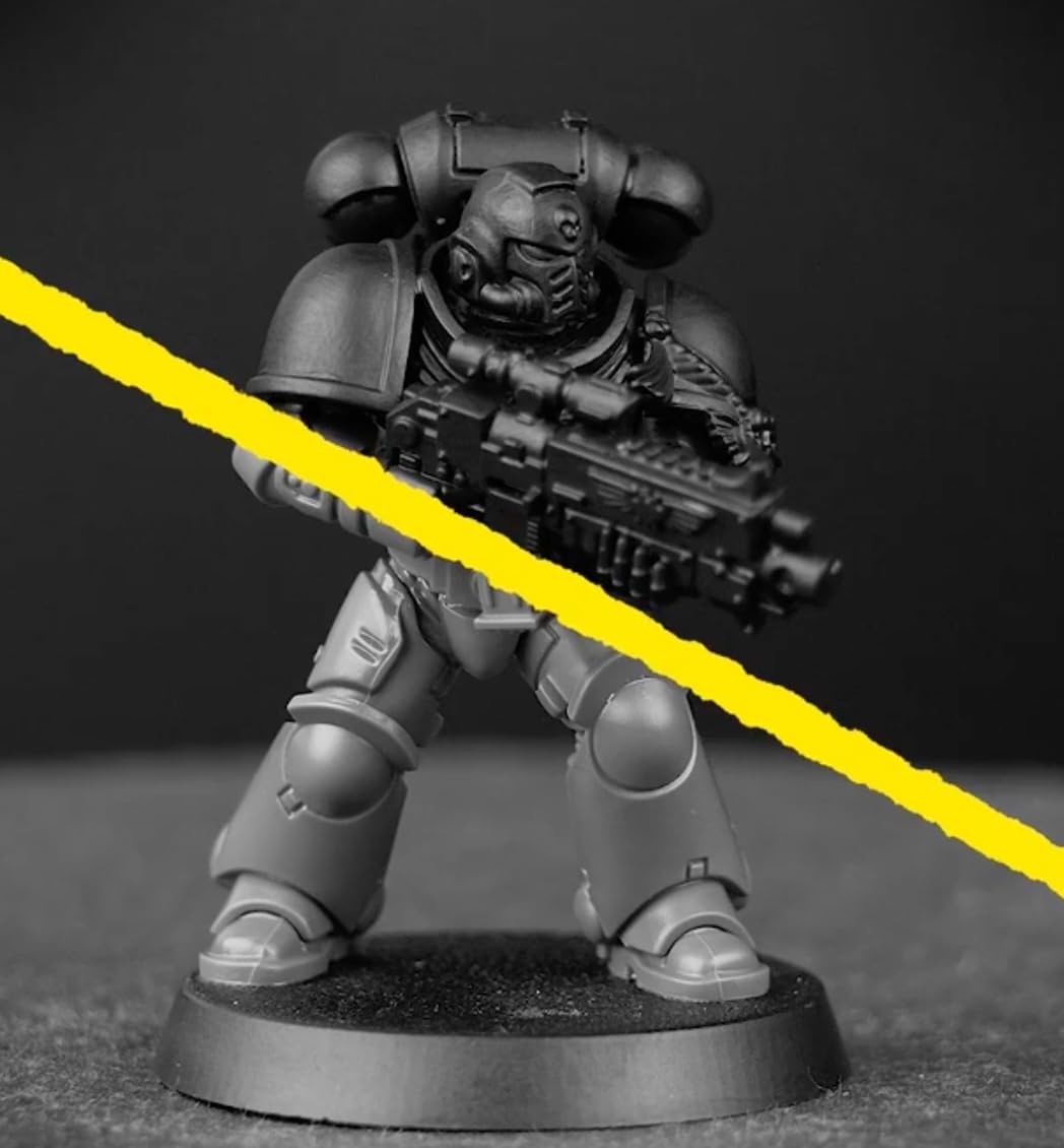 Citadel Chaos Black spray adds depth for detailing on figures.