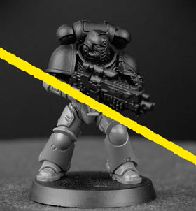 Citadel Chaos Black spray adds depth for detailing on figures.