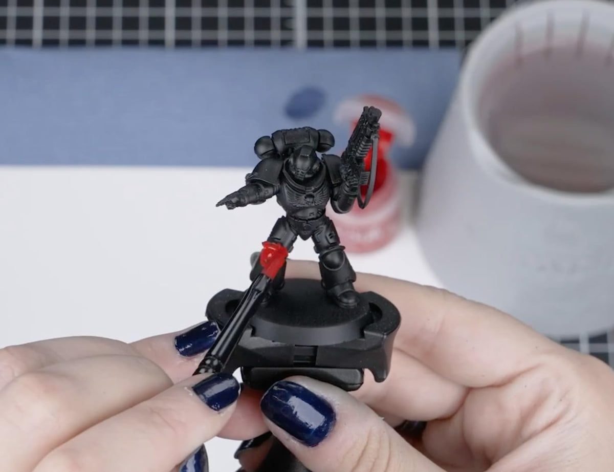 Citadel Chaos Black spray enables fast, consistent coverage on diorama elements.