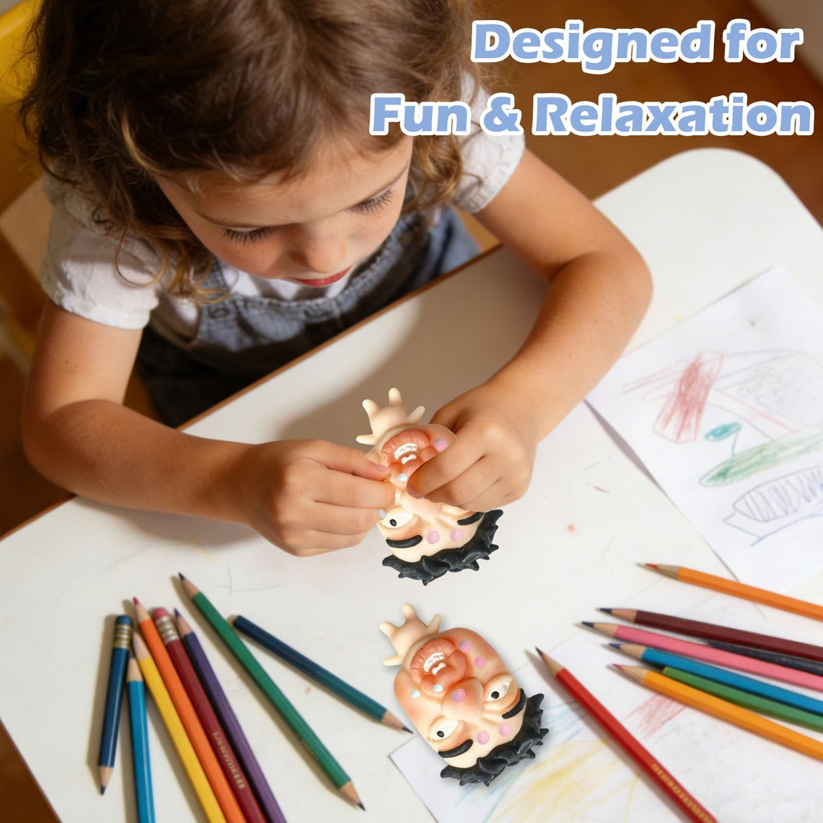 CIYOJA GrumpFace large silicone toy held in hand for tactile relief