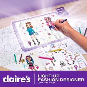 Claire's Light-Up Fashion Designer Tablet open compartment keeps pencils organized for travel