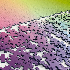 Cloudberries Gradient Puzzle on coffee table evokes calm, inviting puzzling sessions