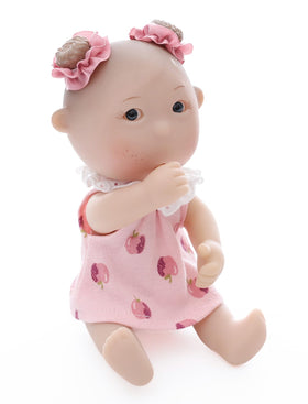Cloveray mini doll closeup face shows soothing expression.