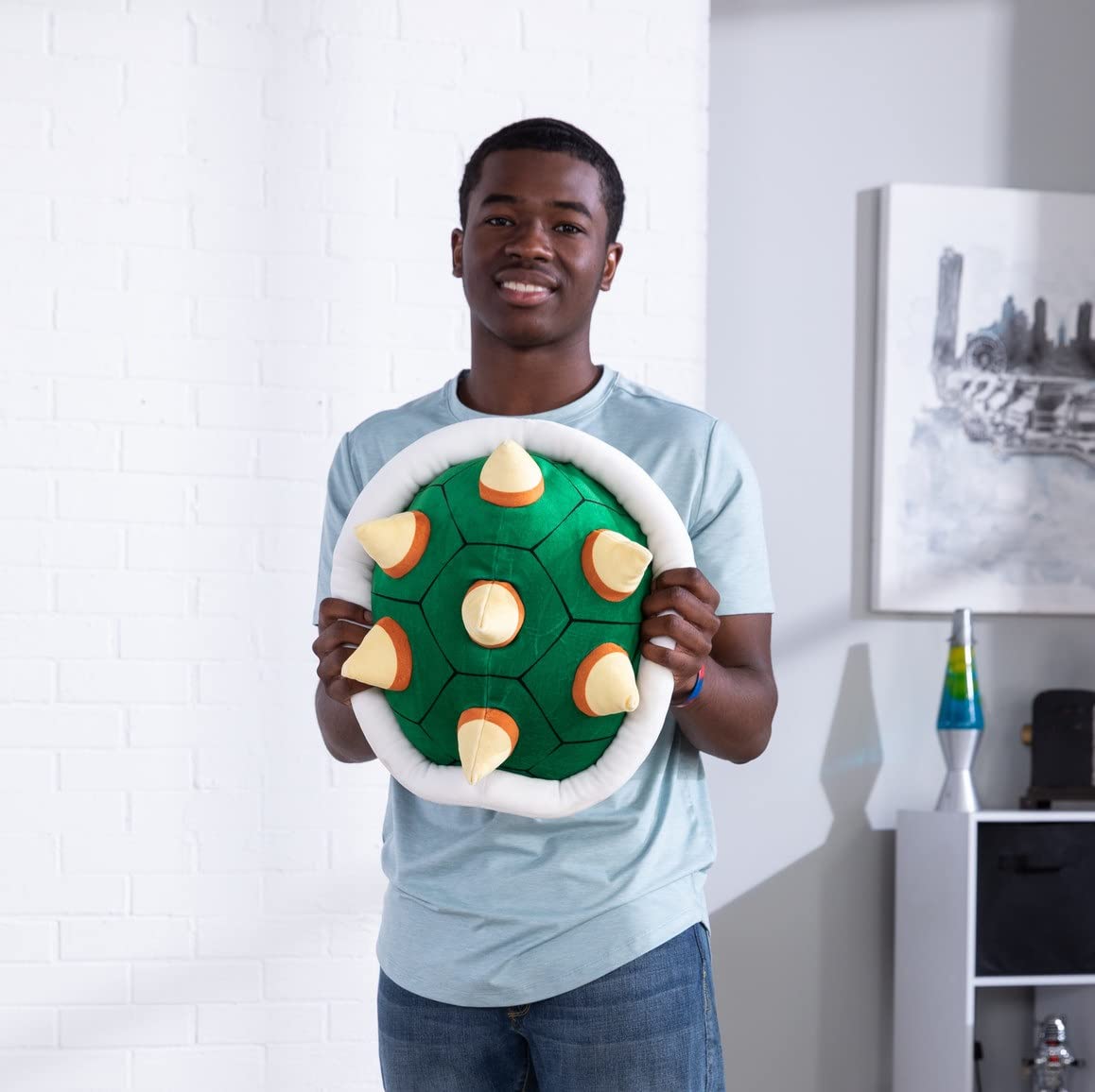 Bowser Shell plush adds Mario-themed decor to a gamer room.
