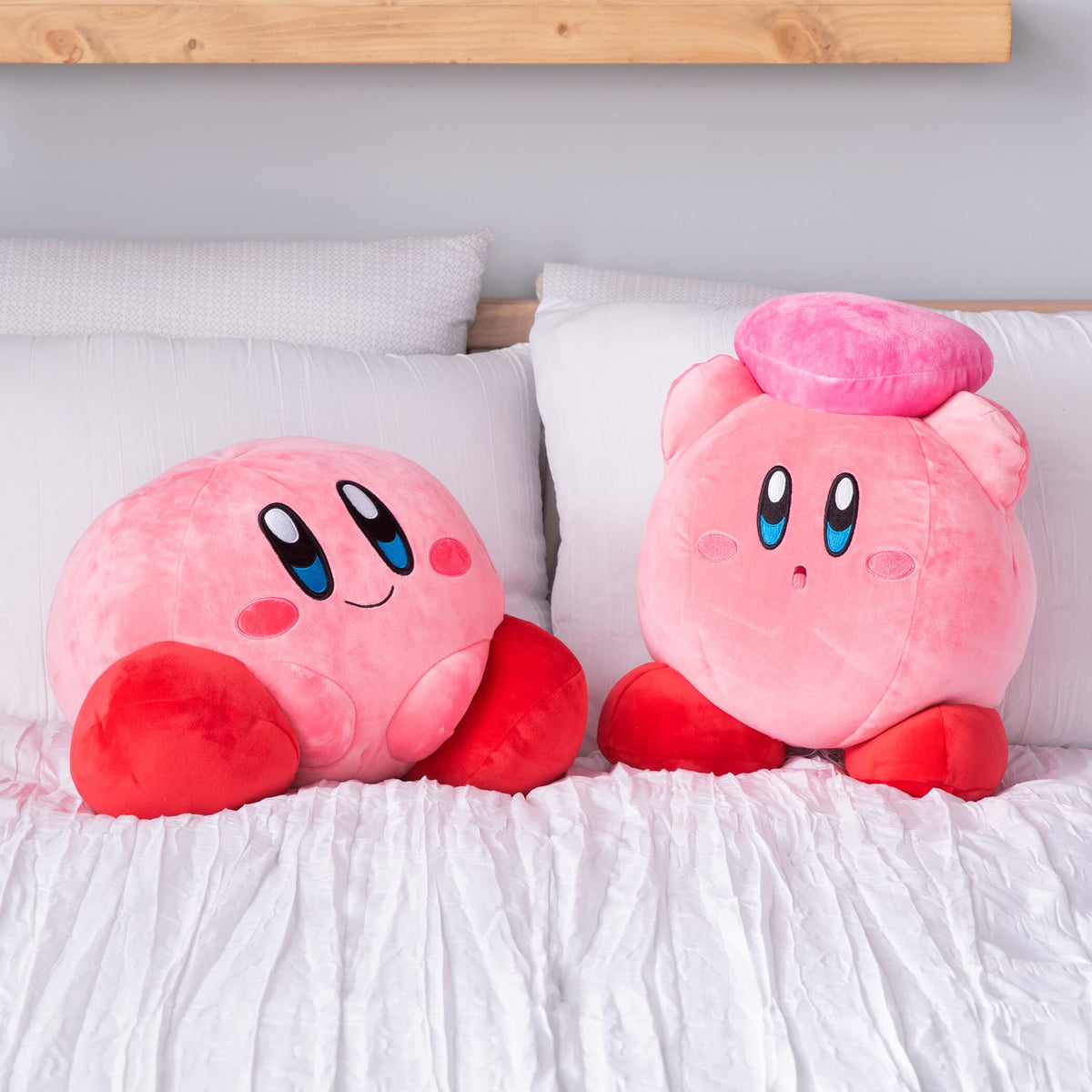 Kirby 15-inch plush used as gamer decor in a game room