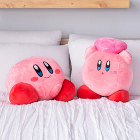 Kirby 15-inch plush used as gamer decor in a game room