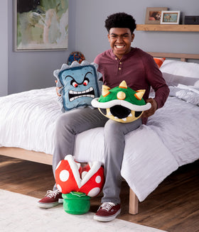 Club Mocchi Mocchi Thwomp plush cuddles enhance game room decor.