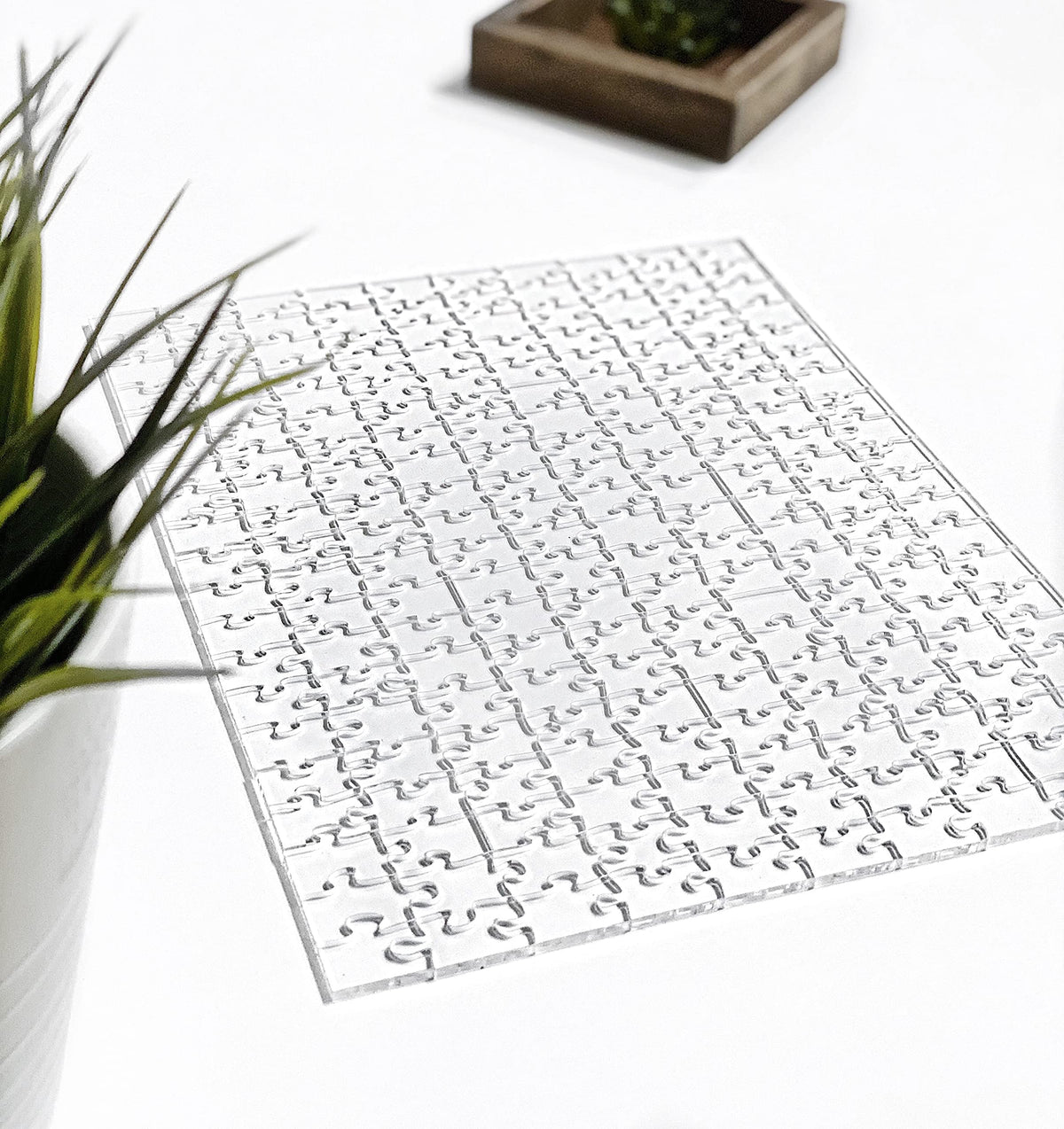 CM Originals Clearly Impossible 200-piece puzzle pieces spread for a varied, engaging challenge.
