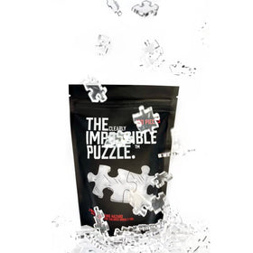 CM Originals Clearly Impossible puzzle during a lively family game night with friends.