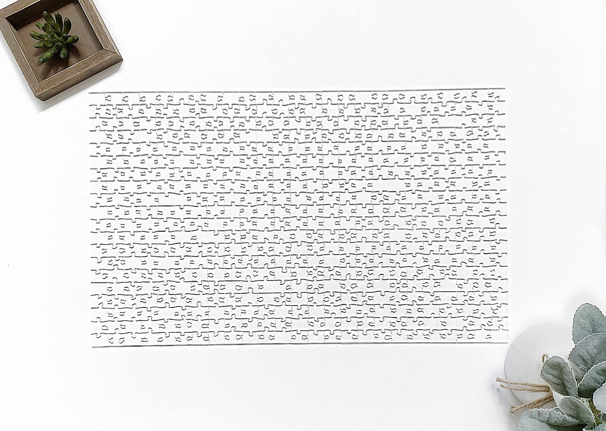 CM Originals Clearly Impossible puzzle pieces close-up highlighting varied shapes for a tough experience