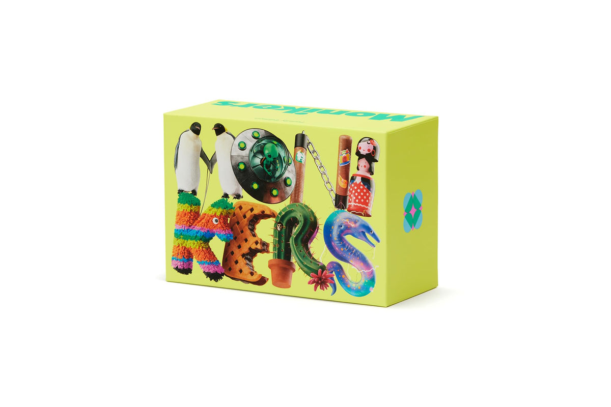 CMYK Monikers Family Edition card deck for quick, playful guessing rounds.
