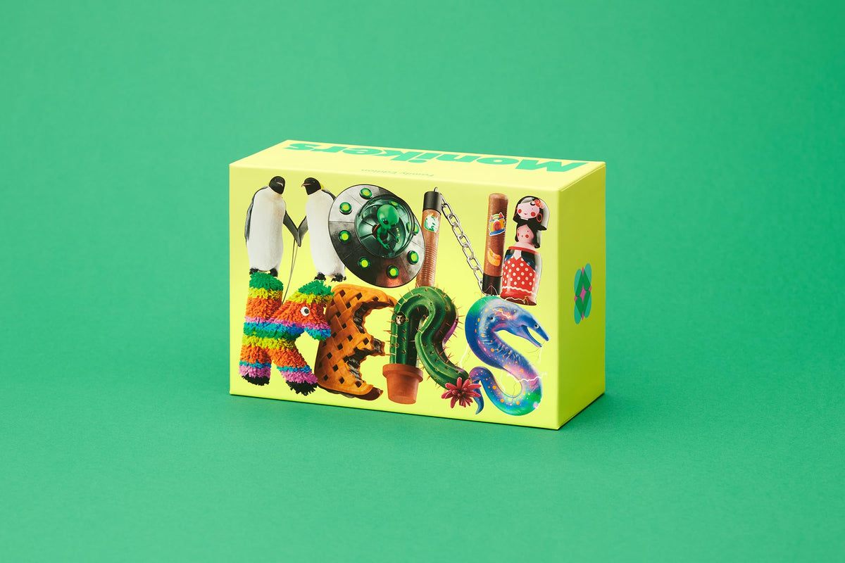 CMYK Monikers Family Edition packaging box displayed for easy gifting.