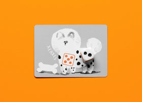 CMYK Spots Dice Game shows rolling dice to match dog spots for quick play.