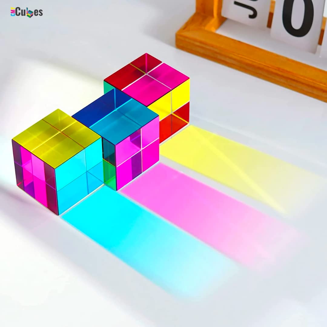 CMY Cubes Original 50mm hand-turning action captures interactive learning moments.