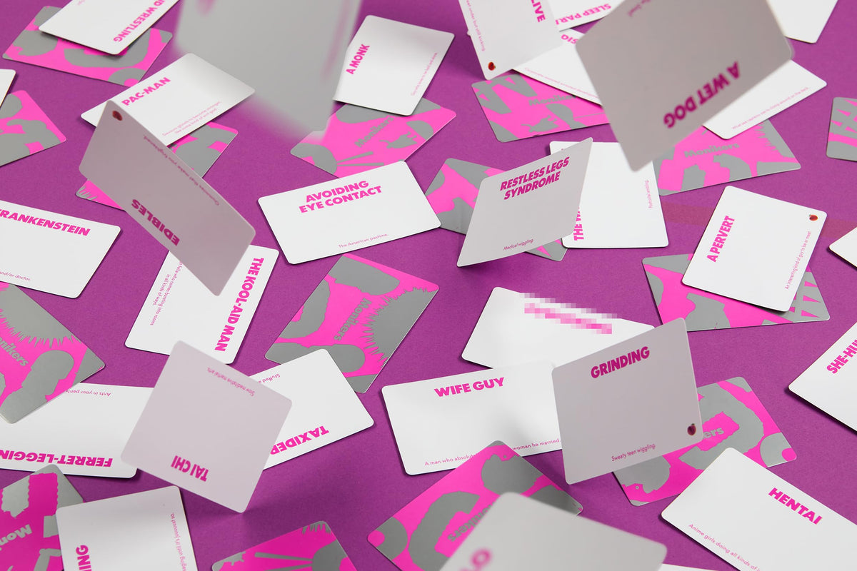 CMYK Monikers family game night scene showing inclusive fun