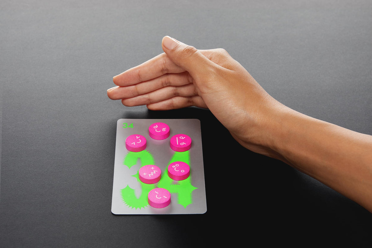 CMYK No Thanks! Magenta Edition deluxe chips and cards, showcasing premium tactile components.