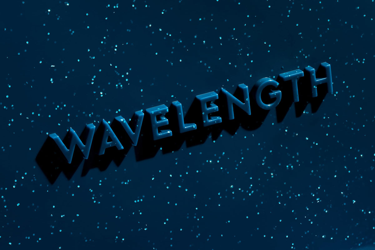 CMYK Wavelength group gathered in a living room enjoying a lively party atmosphere.
