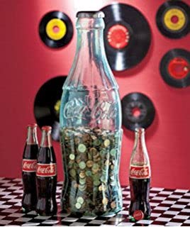 Coca-Cola 21inch bottle bank side view with red accent for contrast