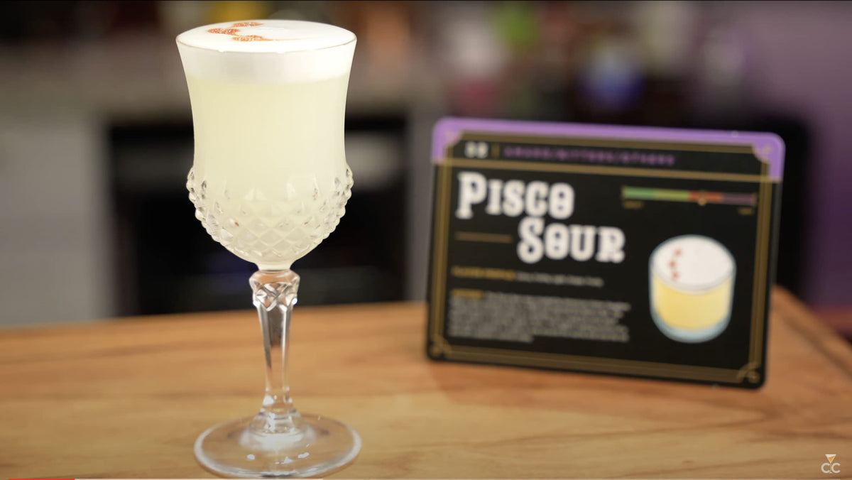 Tablet displaying Cocktail Cards video instruction for a recipe