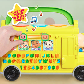 CoComelon bus side view featuring words mode for letter-based vocabulary