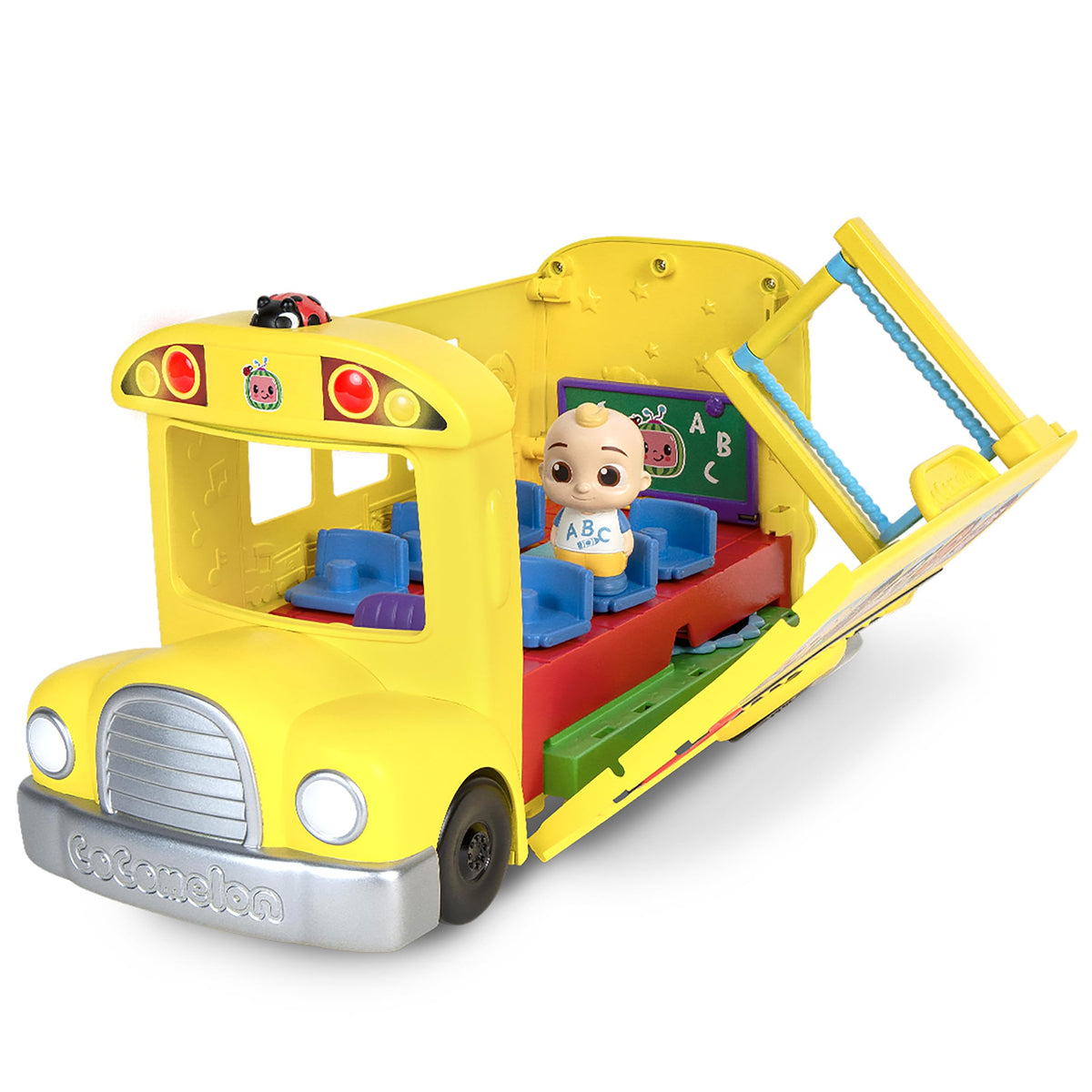 CoComelon Transforming School Time Bus garden scene with vegetables for exploration
