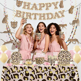 Cocomigo cheetah balloons complete the look with color and whimsy.