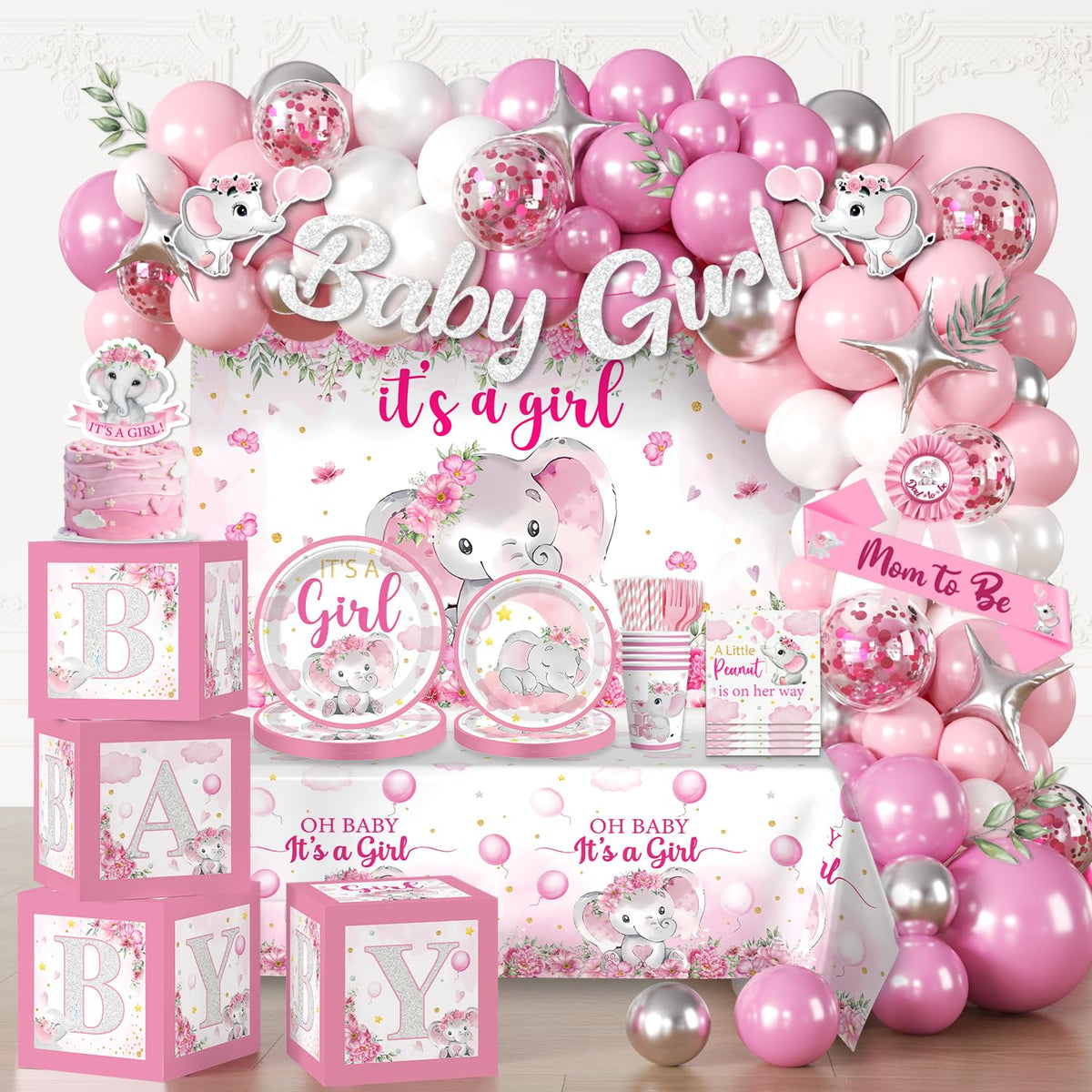 Cocomigo elephant baby shower banner decor creates a festive photo backdrop.