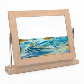 Coitak moving sand art picture on a desk for calming focus