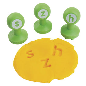 Colorations classroom-ready dough stamps support engaging literacy activities.