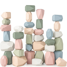 Comfy Cubs stacking rocks 36 pieces in a bright tower boosts fine motor skills and imagination.