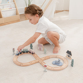 Comfy Cubs wooden train cars invite tactile exploration and storytelling