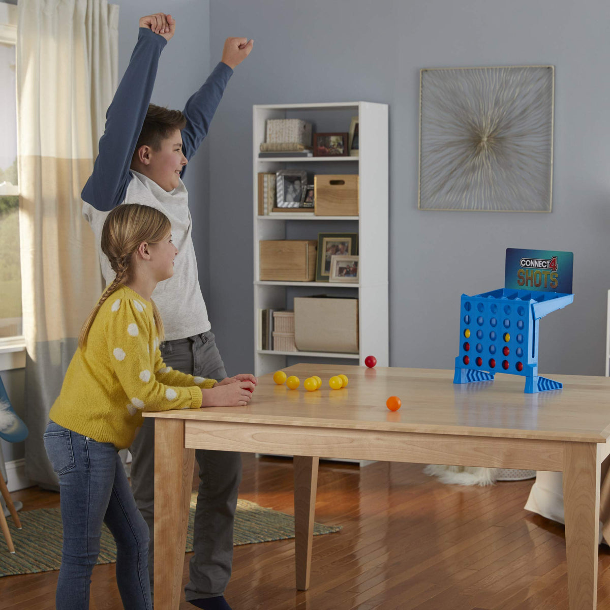 Connect 4 Shots quick-start setup enables instant playtime.