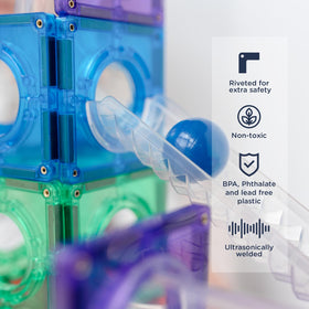 Close-up of colorful tubes and bowls from CONNETIX set highlights hands-on play.